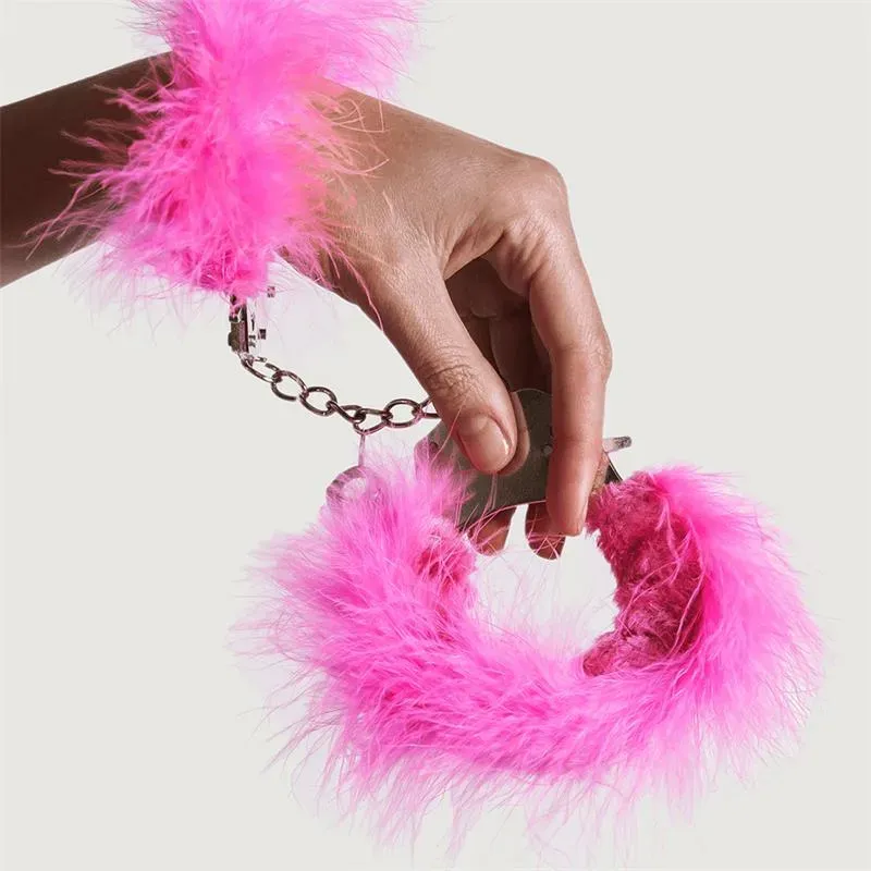 Adrien Lastic metallikäsiraudat höyhenillä, pinkki